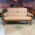 Vintage Scandinavian modern two-seater Stressless sofa produced by Ekornes of Norway. Sofa features light neutral-colored...