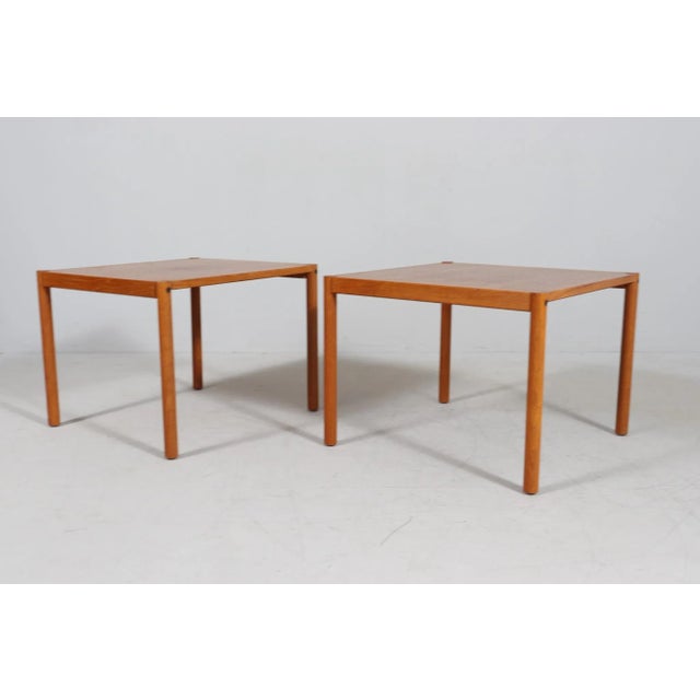 2 nesting tables/side tables from trioh, denmark, 1970s, solid construction made of teak, inscribed on the underside:...