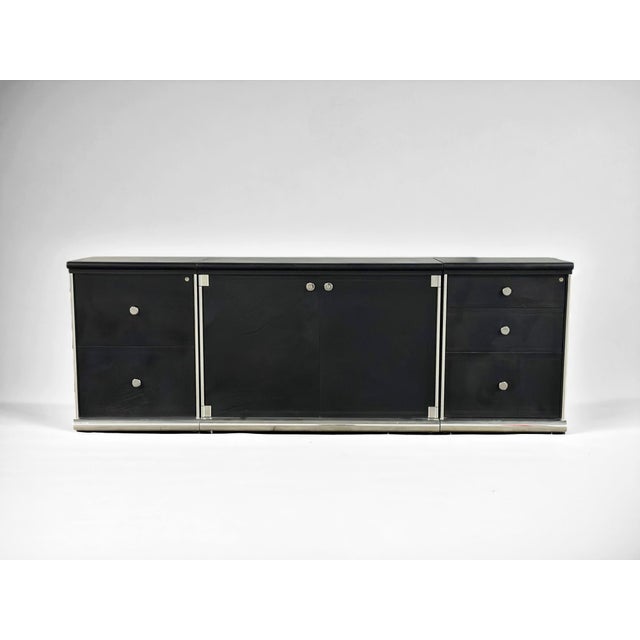 I4 MARIANI FOR PACE LEATHER AND CHROME CABINETS/SIDEBOARD, SET OF THREE. Comprising of two smaller cabinets, one three-...