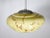 Art Deco ceiling lamp made of marbled opal glass, 1920s–1930s. Tiered lampshade with a softly rounded shape and brown...