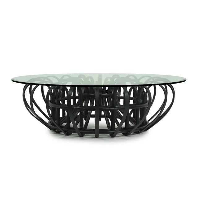 Sourced from Mindanao in the Philippines, where rattan grows for five years before harvest, the Aiden cocktail table is...