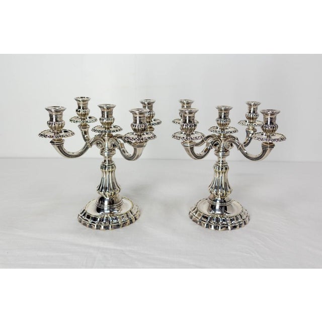 French decorative candle holder in the Louis XV style. Plated bronze. Good condition with nice patina