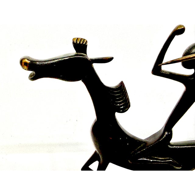 A wonderful bronze figurine by Karl Hagenauer of Hagenauer Werkstatte Austria of a Native American on Horseback. The...