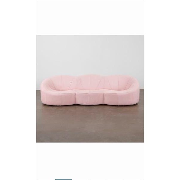 An iconic Pierre Paulin Pumpkin three-seat sofa for Ligne Roset, upholstered in a soft pastel pink fabric. Originally...
