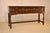 Circa 1900 geometric elm sideboard from England. This sideboard is stylistically from the Jacobean period, but was made in...