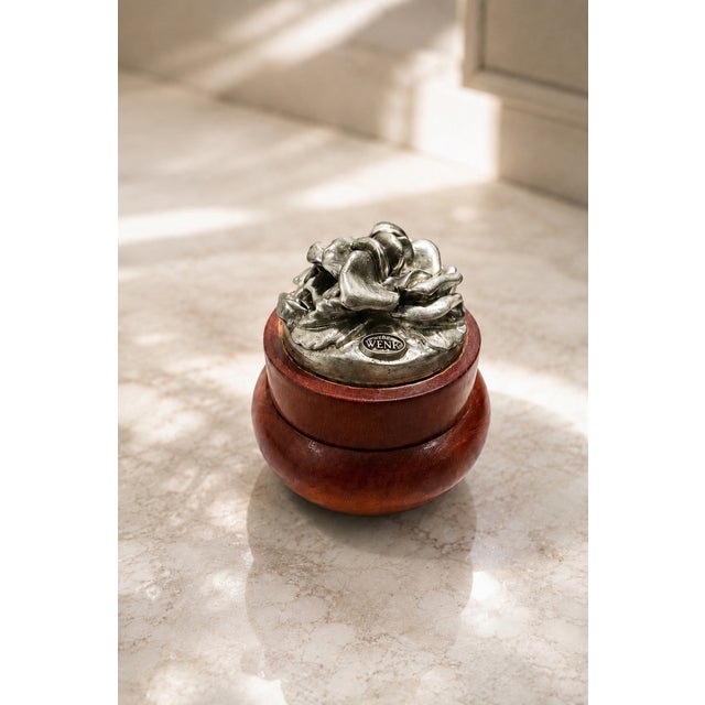 A sophisticated mid-20th-century european artistic production featuring a decorative box signed wenk. The body is...