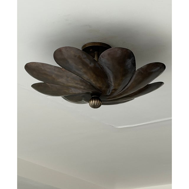 Elevate your interior with this handmade brass flower flush mount ceiling light, a striking sculptural fixture inspired by...