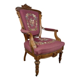Vintage Renaissance Revival Carved Armchair With Burgundy Floral Upholstery For Sale