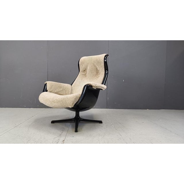 Vintage Space Swivel Armchair by Alf Svensson & Yngve Sandström for Dux, 1970s Plastic shell and original grey fabric...