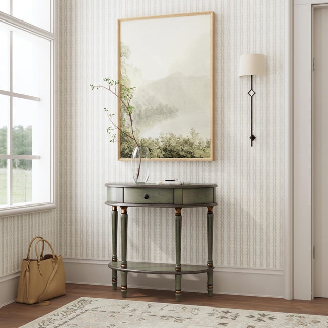 This elegant Butler Specialty Company demilune console table combines classic charm with a sleek, modern finish, making it...