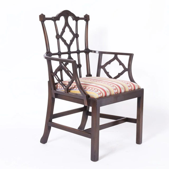 Impressive set of ten mid century armchairs crafted in mahogany in a classic chippendale form designed by Yale Burge for...