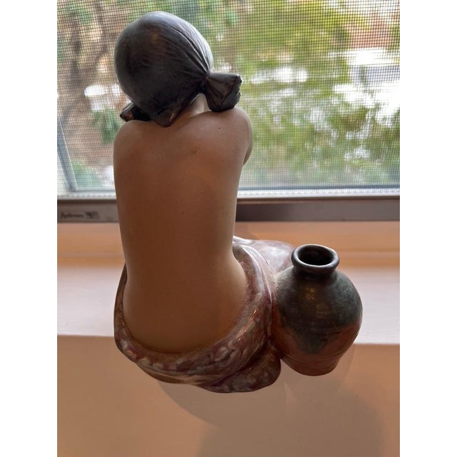 A beautifully contemplative porcelain sculpture titled “Desiree,” introduced in 1984 and designed by acclaimed Lladró...