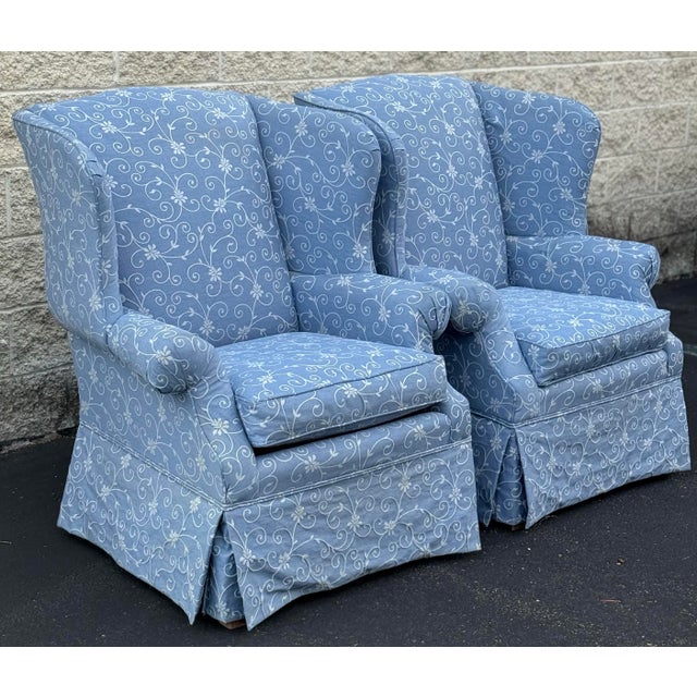 Beautiful pair of upholstered chairs by Broyhill. Features a lovely chambray color embroidered fabric, rolled arms,...