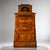This pyramid-shaped secretary from the early 19th century impresses with its architectural design and high-quality...