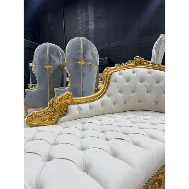 This lovely, comfortable chaise longue has been fully refinished and reupholstered in premium white leather, giving it a...