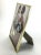 Traditional metal brass and glass frame to display your favorite 8 x 10 photo. In wonderful condition with minimal aging.
