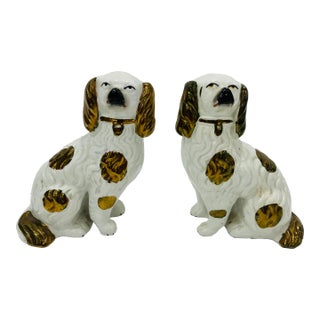 Pair of Antique Copper Luster Staffordshire Spaniels For Sale