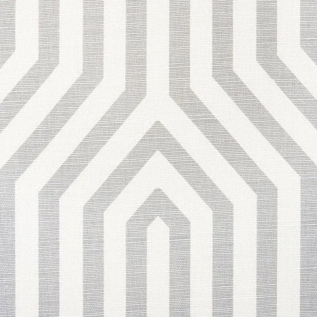 We introduced this large-scale, ziggurat design as a luxe cut velvet. Now, we've translated it into a fun, graphic print...
