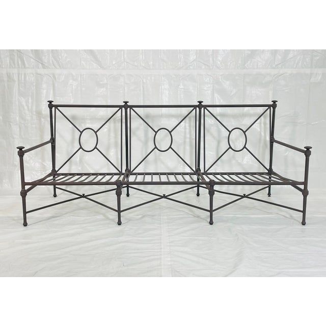 Striking outdoor three-seat sofa, designed and manufactured by Restoration Hardware and part of the "Catalina" collection....