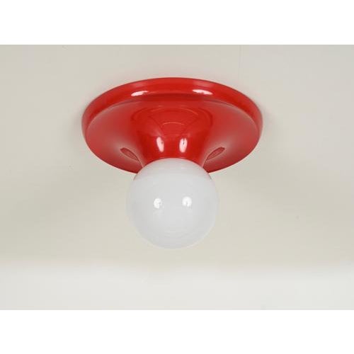 Amazing mid-century “light ball” wall or ceiling lamps in vibrant red enameled metal and opaline glass. This iconic flush...