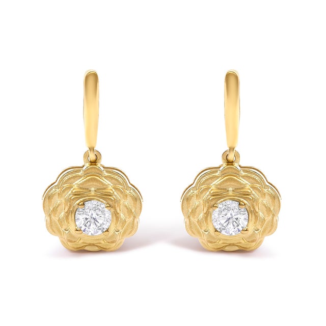 Unveil the essence of elegance and modern craftsmanship with these exquisite earrings, meticulously fashioned from 14K...