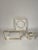 3 piece set of vintage lucite with gold and chrome banded pieces from Palm Beach 1970's. An ashtray, lighter and box in...