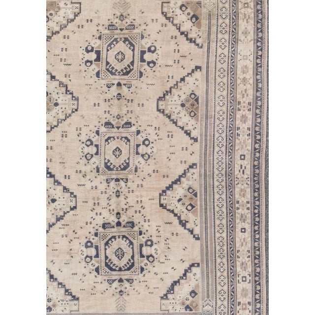 Tribal Vintage Turkish Oushak Rug Featuring Soft Beige Field With Navy Tribal Design For Sale - Image 3 of 9