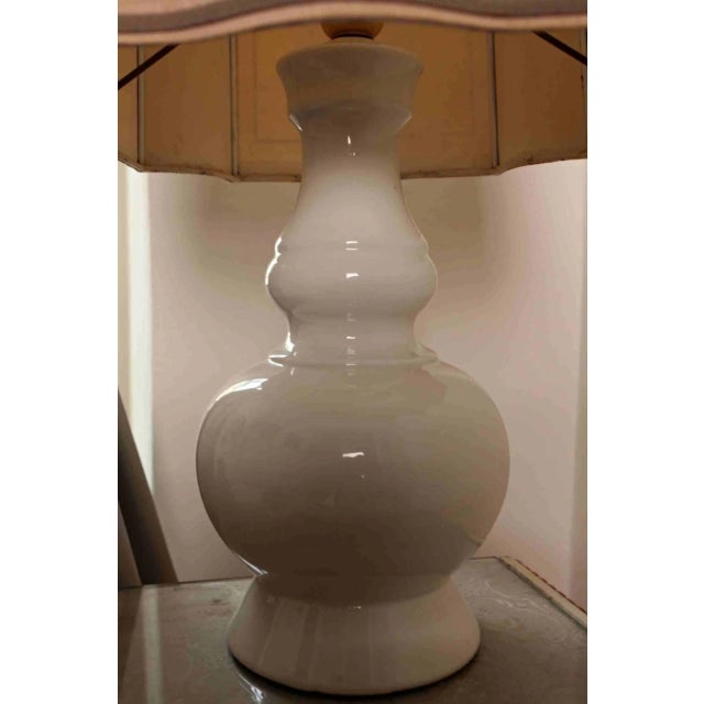 Large table lamp from Belgium with porcelain base and fabric shade. The lamp is functional Dimensions: Height 55 cm...