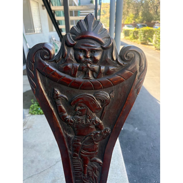 Antique 19th Century Italian Renaissance Revival Carved Walnut Sgabello Hall Chair. Crafted from solid walnut. Hand...