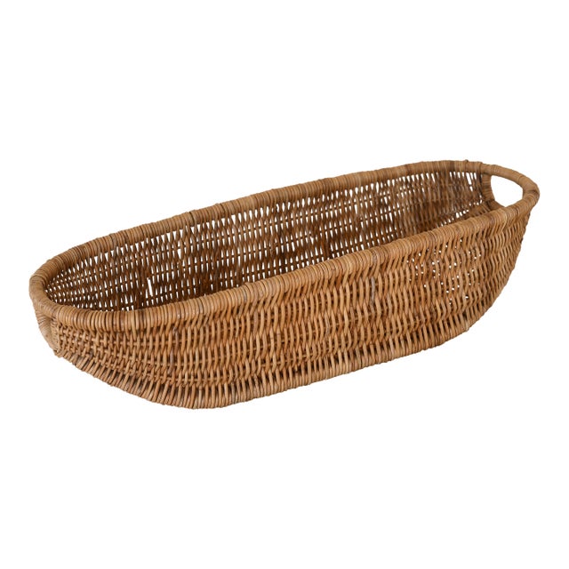 Large Vintage Boat-Shaped Wicker Rattan Basket With Handles For Sale