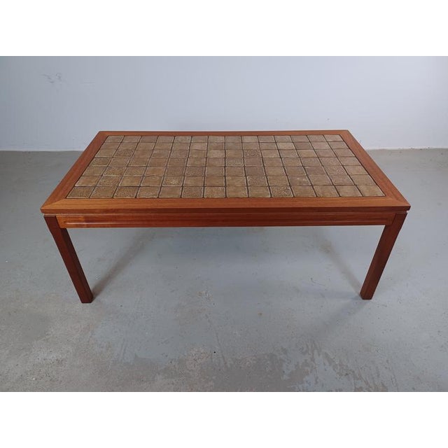 1960s fully restored Danish teak coffe table with tiled table top.