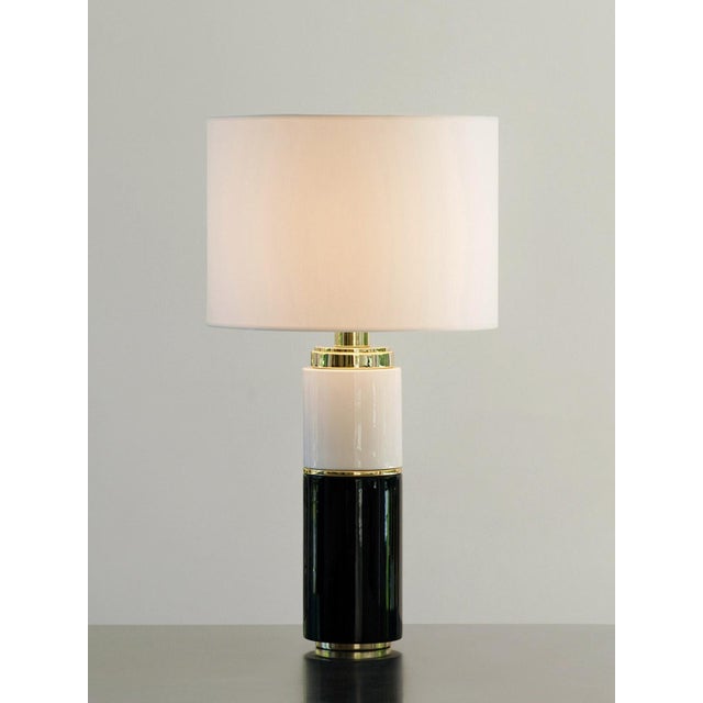 "The body becomes an archive." In black and white, enhanced with a touch of gold, this lamp is a true interior jewel,...