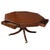 A Regency style center table crafted in rich mahogany, featuring a distinctive octagonal top inset with a finely tooled...