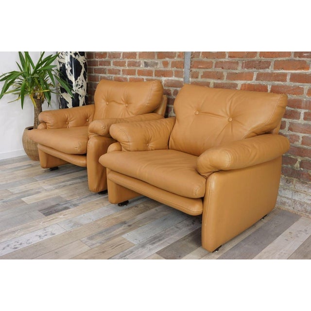 These Coronado leather armchairs were designed in 1966 by Afra and Tobia Scarpa for B&B Italia. Offering unparalleled...