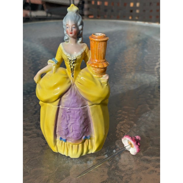 A beautiful and scarce Bavarian porcelain perfume/scent bottle and trinket box. The lovely lady is in colonial fashion...