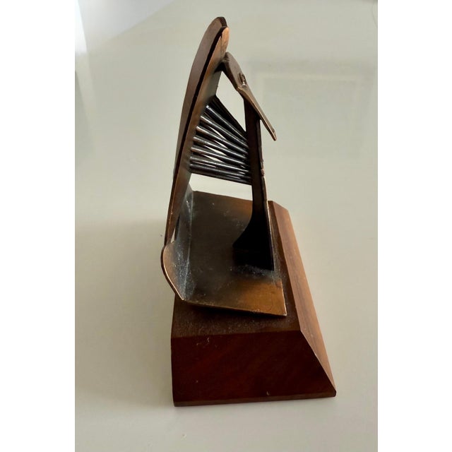 This is a souvenir model of the large Picasso sculpture in Chicago it is a vintage piece. it is marked 1967 and 1970 and...