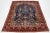 This beautiful vintage Kashan wool rug has a navy blue field with an all-over design in multicolor. This rug measures...