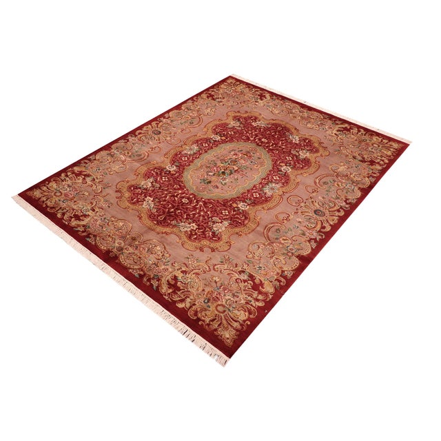 Designed with mesmerizing intricacy and gorgeous color palette, this hand-knotted masterpiece demonstrates the beauty and...