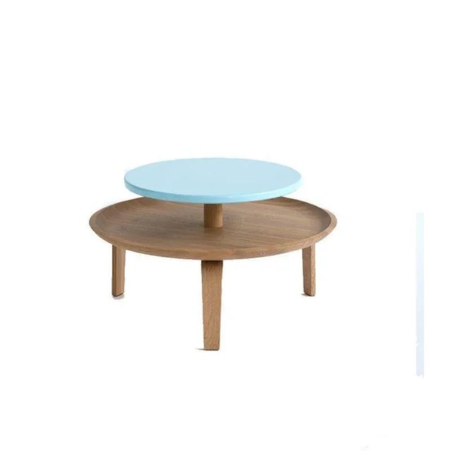 Secreto 60 coffee table, Azure “Cypre” by Colé Italia Dimensions: H.32; base plate ø 60 top ø 45 cm Materials: Coach table...