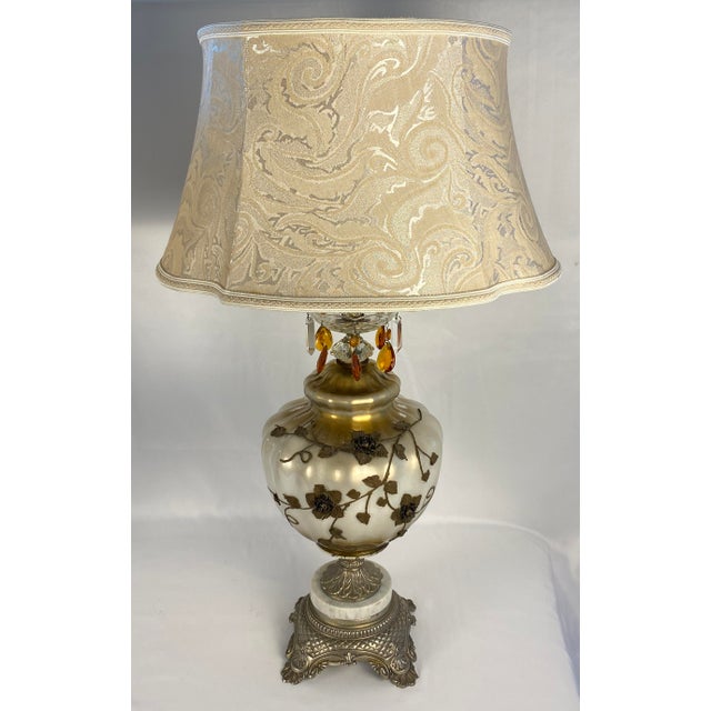 A nice pair of mid-century Opaline glass table lamps in the classical style. This good quality pair of table lamps.The...