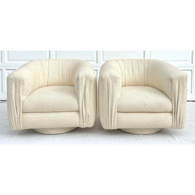 Here is a pair of matching swivel chairs custom made by Martin Brattrud, Inc. in 1989. They are beyond fabulous! Each...