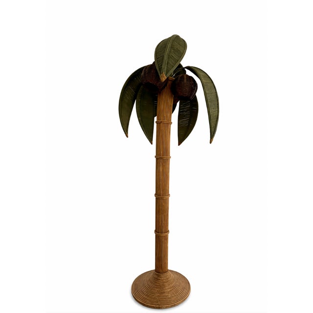 Lamp features 3 "coconut" lamp shades and removable and adjustable palm "fronds".