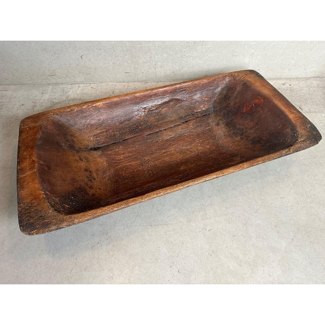 This is an antique, hand-carved wooden trough from the 19th century. The bottom was once repaired with iron fittings. Very...