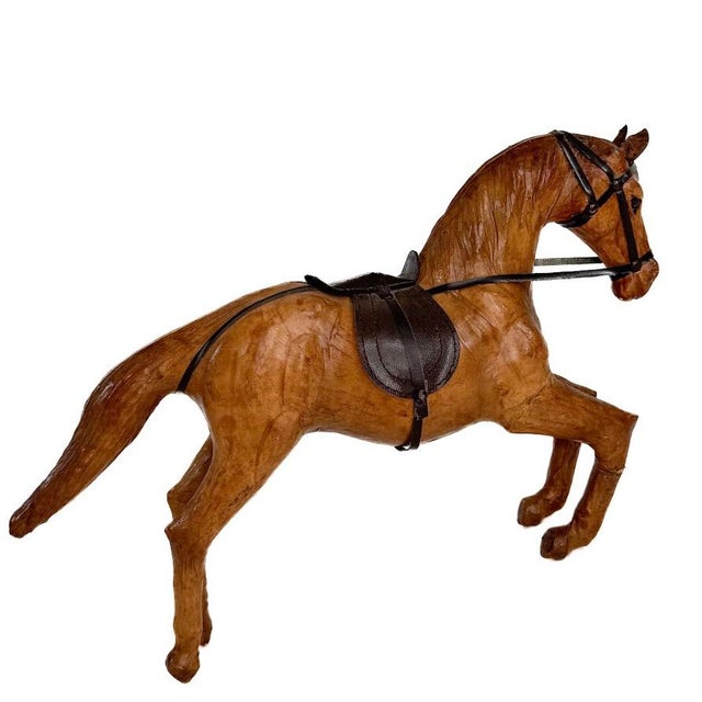 Charming Handmade Vintage Leather Horse. Note that the horse is kneeling on its front legs when it's standing upright.
