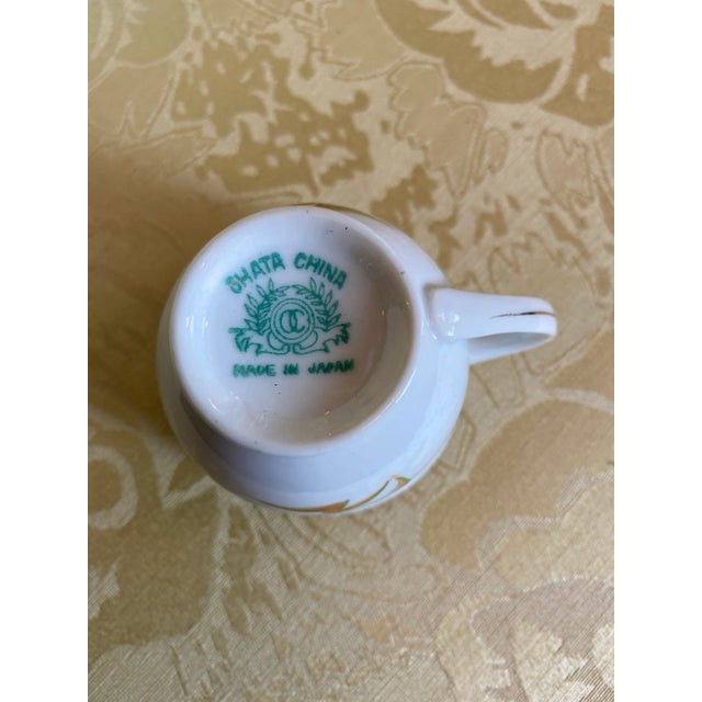 Shata China Coffee/Tea Set in a Golden Wheat Design with a touch of Green and Gold Accent Colors. Coffee/Teapot with Four...