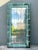 This vintage patinated copper shingle floor mirror by Olde Good Things makes a bold architectural statement through its...