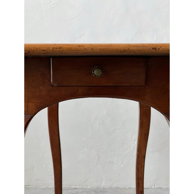 Absolutely stunning marquetry Louis XV game table. This table has a single slender drawer on either end. Accented with...