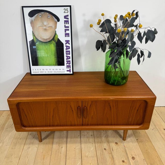 Dyrlund low sideboard with retractable teak doors, Denmark 1960