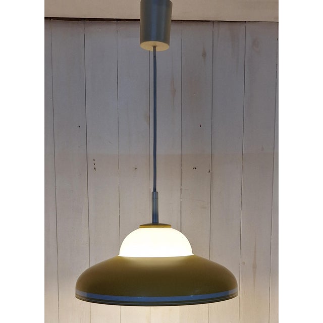 Vintage Hanging Lamp with White Glass Shade and Yellow-White Metal Shade by Doria, 1970s, in Very Good conditions....