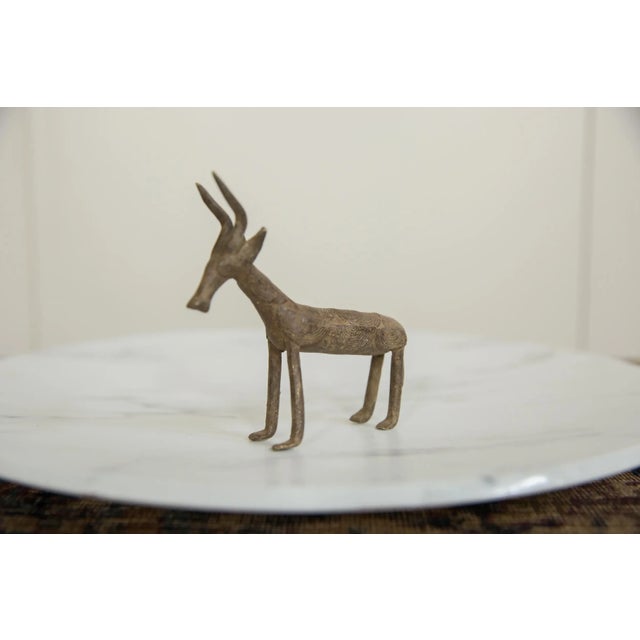 :: Vintage handmade African bronze antelope. Circa mid 20th century and possibly older, this piece has such incredible...